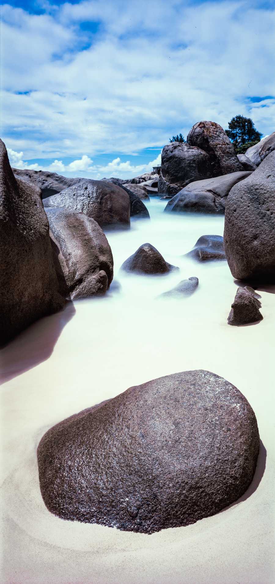 Rock surrounded by water