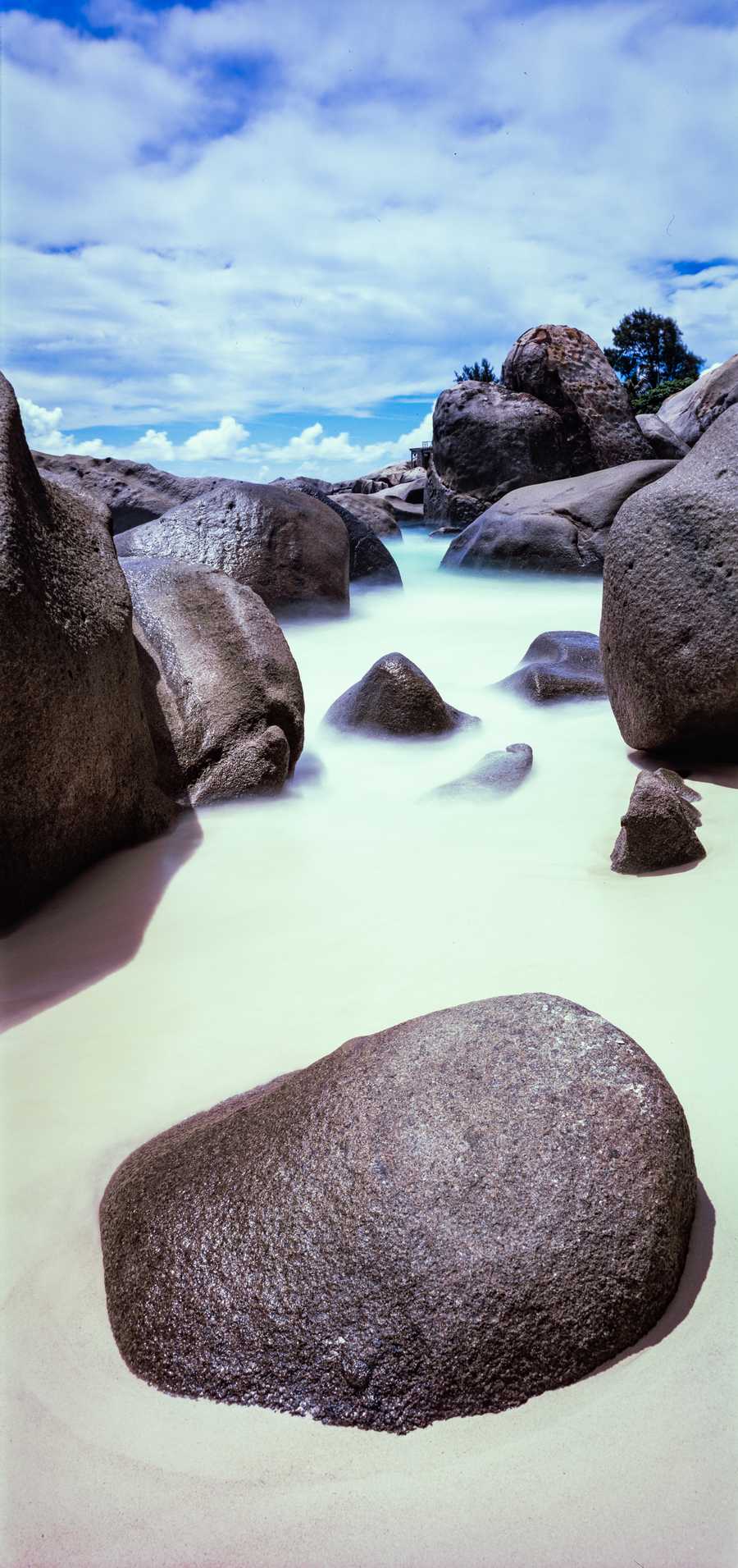 Rock surrounded by water